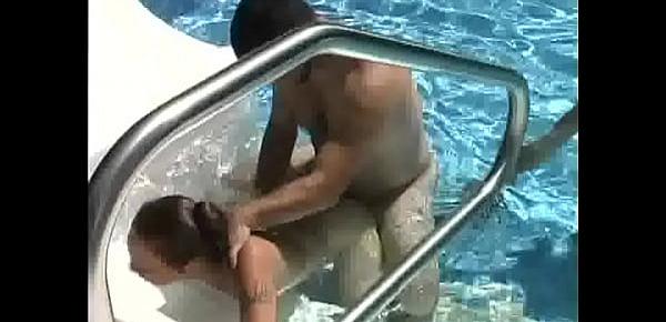  Brunette MILF babe gets fucked by a pool before 69ing